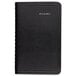 A black At-A-Glance DayMinder weekly pocket appointment book with contacts section and silver text on the cover.