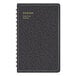 A black spiral-bound At-A-Glance telephone address book.