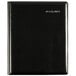 a black leather notebook with silver writing