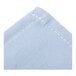 A light blue cloth table cover with white stitching.
