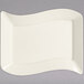 A Fineline ivory plastic rectangular dessert plate with a curved edge.