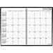 A spiral bound black At-A-Glance monthly academic planner for July 2024 to August 2025 with white pages.