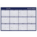 An At-A-Glance reversible wall planner with blue and red numbers on a white background.