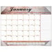 An At-A-Glance desk pad calendar with a marble burgundy design and black text.