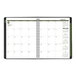 A black At-A-Glance weekly/monthly appointment book with green accents and white calendar pages.