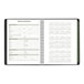 A black spiral bound At-A-Glance appointment book with calendar pages.