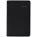 A black At-A-Glance QuickNotes monthly planner with silver writing on the cover.