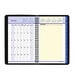 A black spiral bound At-A-Glance QuickNotes monthly planner with numbers on it.
