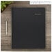 A black At-A-Glance daily appointment book with gold text.