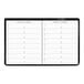 A black At-A-Glance padfolio with white pages open to a monthly spread.