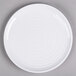 A white Elite Global Solutions melamine plate with a swirl design.