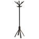An espresso brown Alba wood coat stand with three legs.