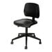 A black office stool with a black seat cushion and wheels.