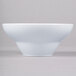 a white bowl on a gray background