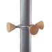 A metal pole with wooden knobs on top.