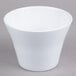 A white bowl with a lid on a gray background.
