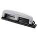 A black and silver Bostitch PaperPro 3 hole punch.