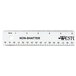 A white Westcott shatterproof ruler with black standard scale text.