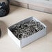 A box of Acco metal book rings.