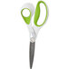 A pair of Westcott scissors with white and green handles.