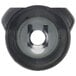 A black circular button with a hole in the middle.