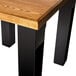 A BFM Seating black rectangular standard height table base.