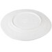 An off white Elite Global Solutions Della Terra melamine plate with a circular pattern.