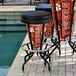 A group of Holland Bar Stool Clemson University LED Bar Stools on an outdoor patio.