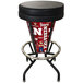 A Holland Bar Stool with a black vinyl seat and University of Nebraska logo on the table in a cocktail bar.