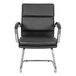 A black leather Alera Neratoli arm chair with chrome legs.