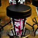 Holland Bar Stools with Texas A&M logo on black seats at an outdoor table.