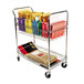 An Alera silver metal mail cart with two shelves full of files and folders.