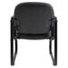 The back of a black Alera Genaro arm chair with a metal frame.