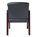 A black leather Alera reception arm chair with mahogany wood legs.