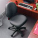 An Alera office chair with a black seat and back on a gray swivel base.