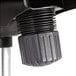 A close-up of a black leather Alera Neratoli office chair arm.
