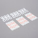 3M Command White Mini Hooks with red labels on the packaging.