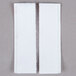 Two white pieces of paper with a 3M white multi-purpose fastener strip on the back.