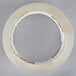 a roll of tape on a gray background