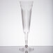 a clear glass with a long stem