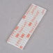 A clear plastic wrapper with a white and orange 3M label.