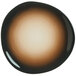 A brown and white porcelain plate with a circular design in the middle.