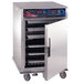 A large stainless steel Cres Cor roast-n-hold convection oven with trays inside.