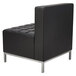 A black Alera armless sectional with silver legs.