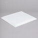 A white rectangular melamine serving platter.