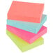 A stack of Post-It notes in various colors.