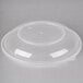 A clear plastic lid on a round catering bowl.