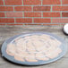 A Fineline black plastic catering tray with cookies on a table.