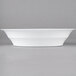 A white Fineline low profile plastic catering bowl.