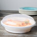 A white plastic Fineline low profile serving bowl with food in it.